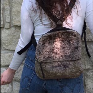 Urban Outfitters faux furry backpack